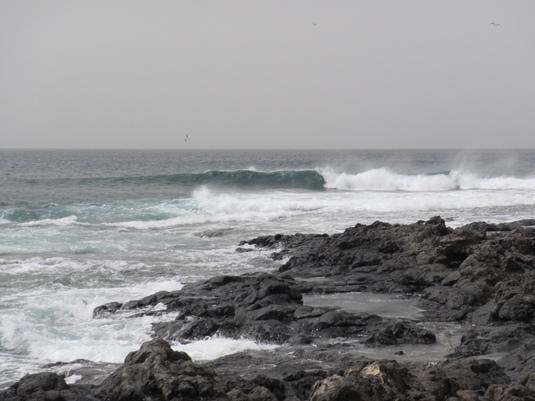 Black volcanic rocks and waves, La Caleta, Tenerife - 2015.